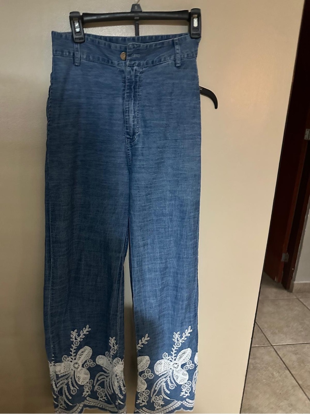 High-Rise Blue Wide-Leg Jeans with White Embroidered Hem